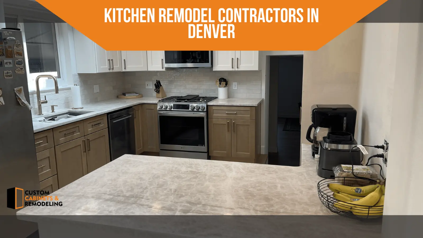 Modern remodeled kitchen in Denver featuring a quartz island, custom two-tone cabinets, stainless steel appliances, and subway tile backsplash