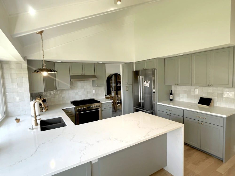 Custom kitchen remodeling in Aurora showcasing bright open layout and island design